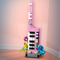 Конструктор LEGO Creator Дикі тварини: пандові 626 деталей (31165)Конструктор LEGO Creator Друкарська машинка з квітами 363 деталі (31169)