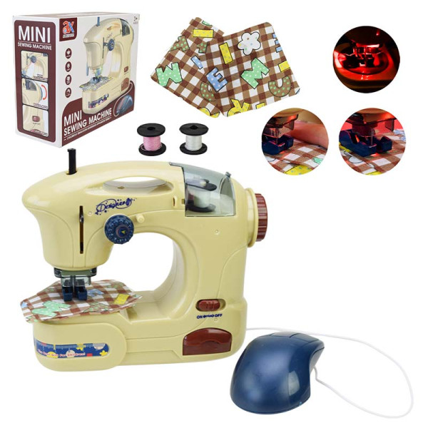Іграшка "Швейна машинка" зі звуком та світлом 6815A Іграшка "Швейна машинка" зі звуком та світлом 6815A